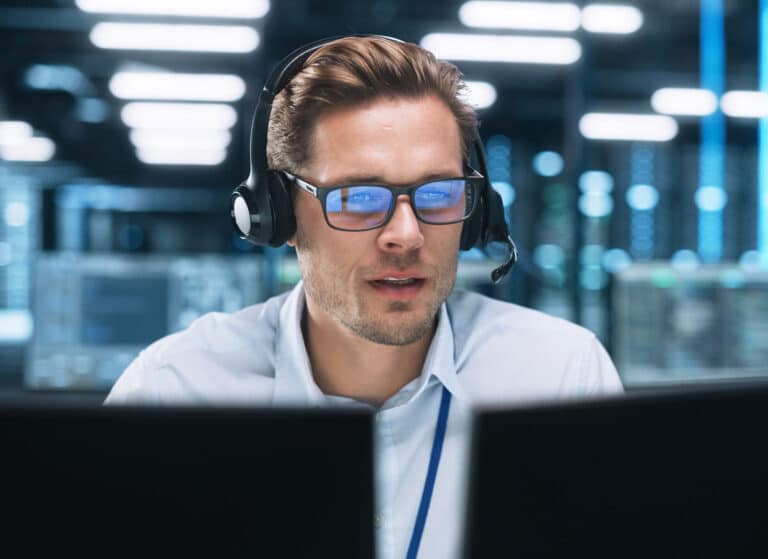 Male Call Centre Worker Wearing a Phone Headset